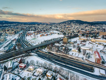 aerial view over a snow covered city 