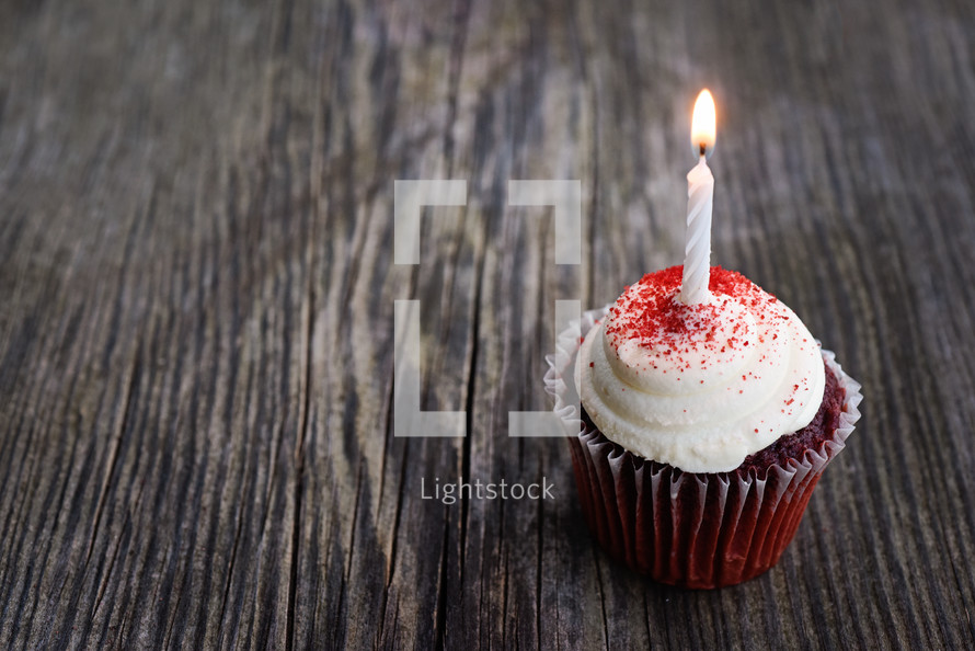 candle on a birthday cupcake 