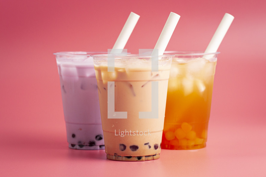 Three Types of Boba Tea on a Pink Background