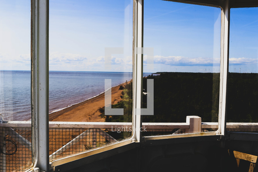 view of the ocean out a beach house window