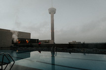 rooftop pool on a rainy day