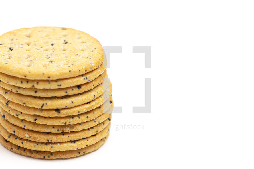 Sesame and Poppy Seed Crackers Isolated on a White Background