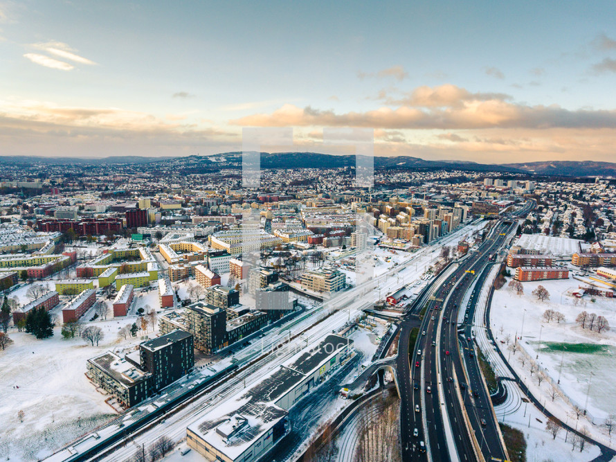 aerial view over a snow covered city 