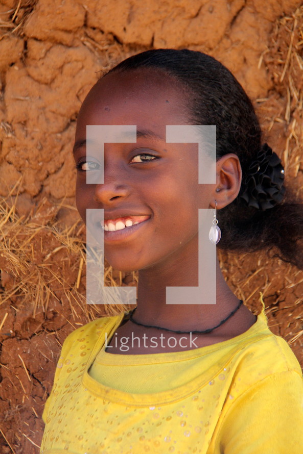 Smiling Ethiopian teen girl in Africa 