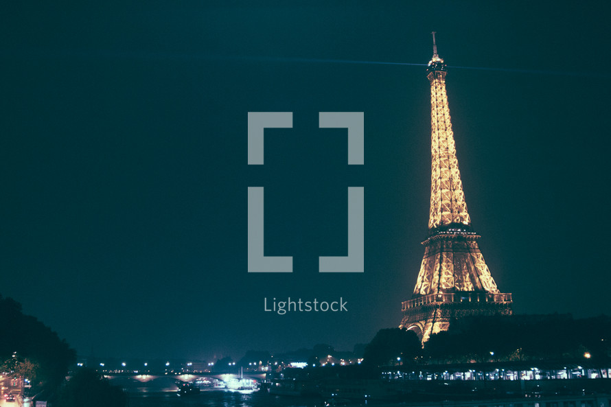 lights at night on Eiffel Tower