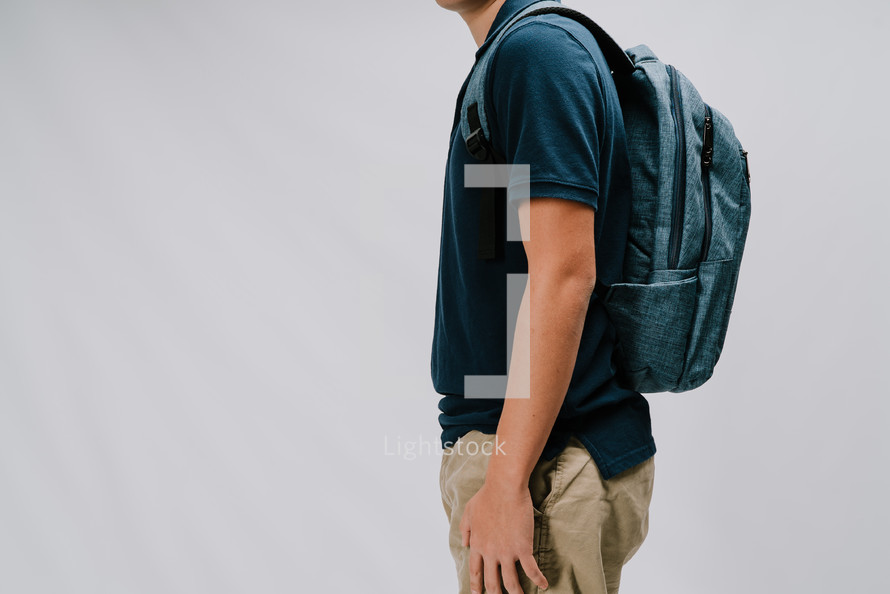 teen boy with a backpack 