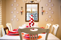 Dining room table decorated for Christmas