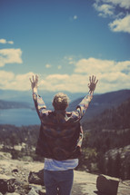 outstretched arms, mountain top, open arms, man, standing, back to the camera