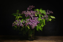 Lilac Purple Bouquet In Glass Vase in Studio