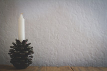 pine cone candle holder and candle 