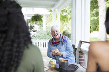 woman's group Bible study on a porch 