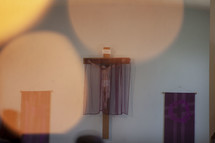 purple shroud over crucifix 