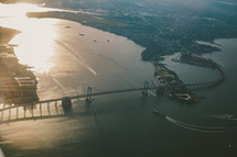 aerial view over NYC bridges at sunset 