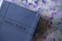 Blue Bible on floral pattern 