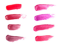 Collage of Lipsticks Smears in Various Colors on a White Background