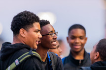 group of smiling young men 