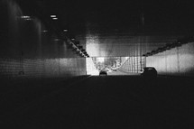 cars going through a tunnel 