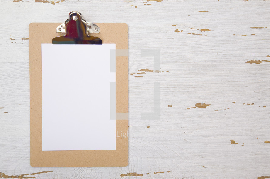 clipboard with white paper 