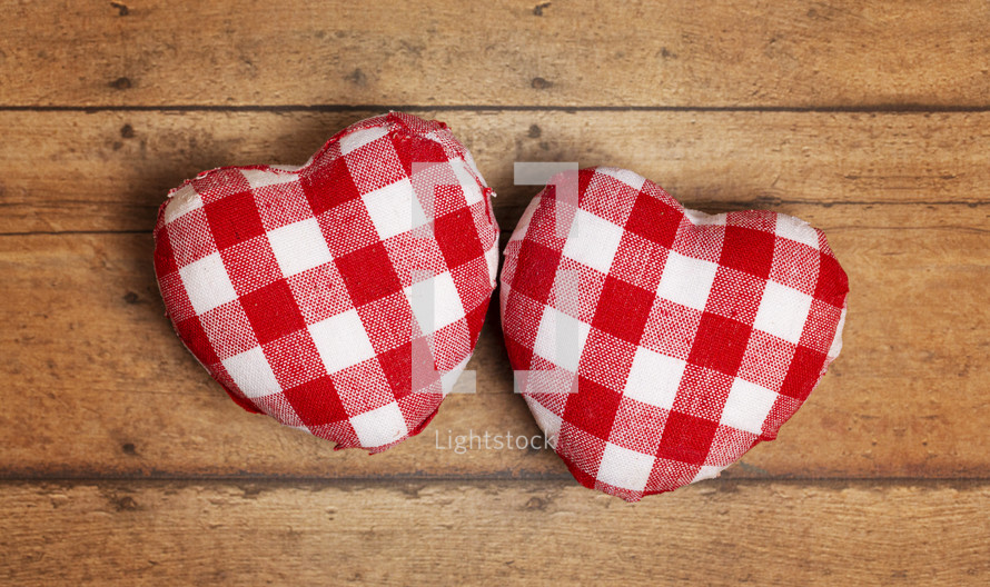 Red and White Plaid Love Heart on a wood Background