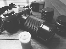 camera, lenses, and film canister 