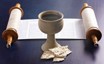 scroll, wine chalice, and unleavened bread