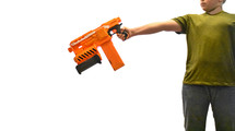 a child with a toy gun 
