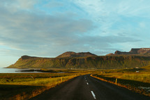rural road and green cliffs 