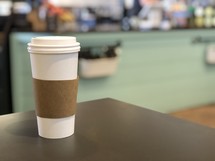 to go coffee cup on a table 