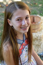 portrait of a teen girl with braces 