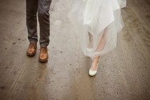 feet of a bride and groom 