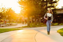 Teenage girl walking back to school, early morning golden sun, backpack, school campus, student, youth