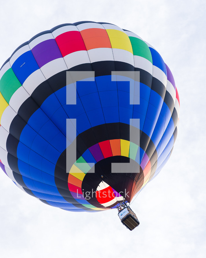 a colorful hot air balloon in flight 