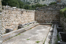 These are the public toilets at the ruins from Ancient Philippi. These toilets date to the 3rd century AD. Philippi was the home of Lydia the merchant who befriended the Apostle Paul in Acts 16 of the Bible. 

