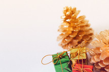 gold pine cone and small gifts 