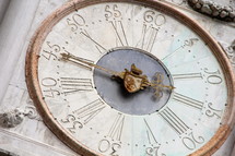 Vintage clock with Roman numerals.