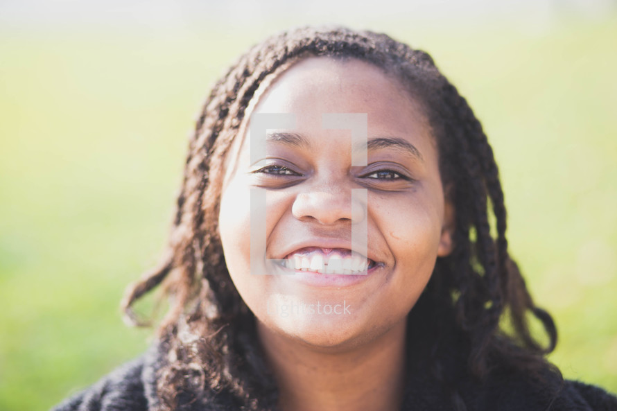 face of a smiling African American woman 