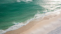 Beautiful aerial shot of a white sand Florida beach.