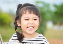 laughing Asian child 