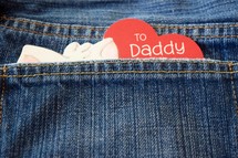 father's day card in a jeans pocket 