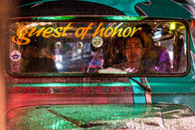 guest of honor on the windshield of a cab 
