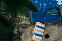 a towel by a pool 