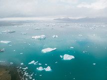 aerial view over icebergs 