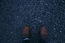 dress shoes on asphalt 