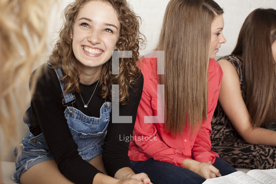 group of young female friends at a Bible study 