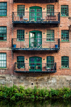 balconies on a brick building 