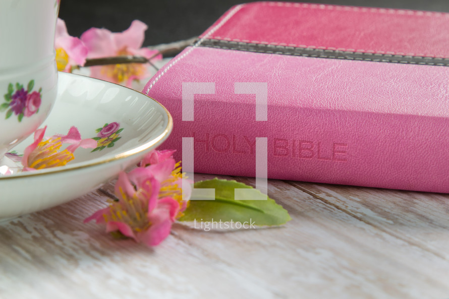 Pink Bible and floral coffee cup 