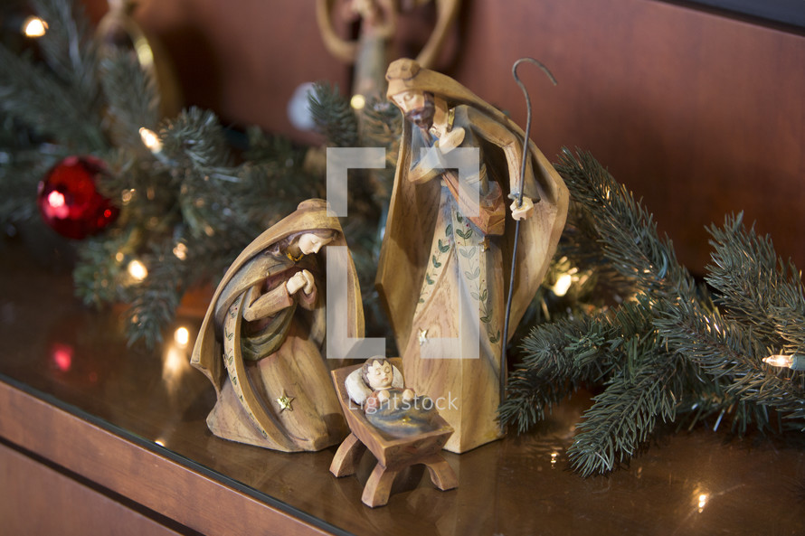 Wooden Nativity Scene with Garland
