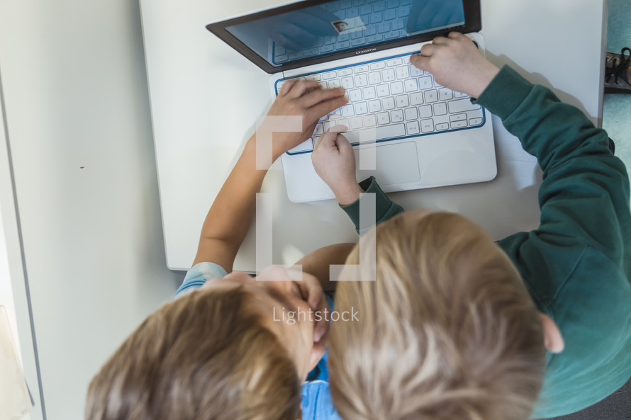 boys on a laptop computer 