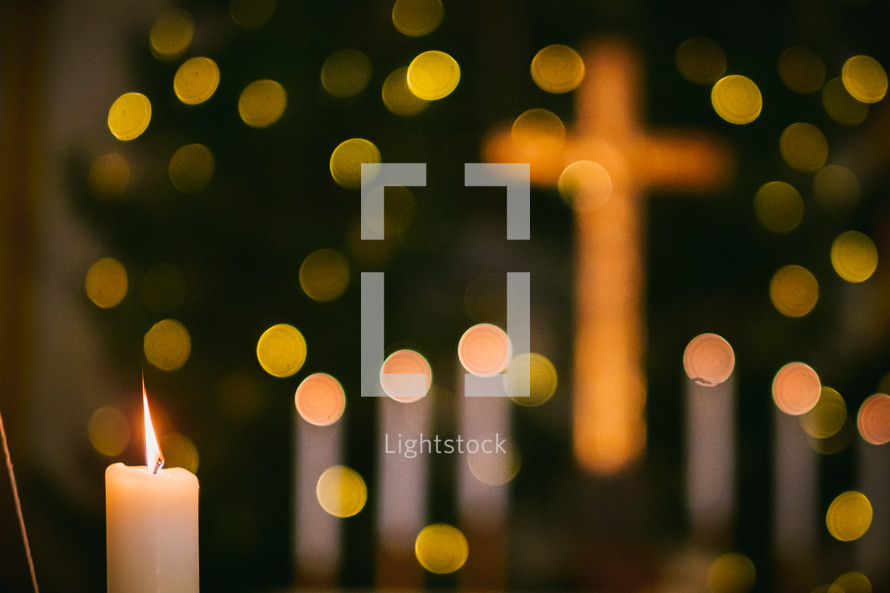 bokeh cross and candle 