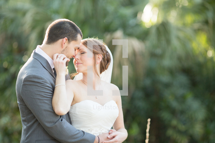 portrait of a bride and groom outdoors 